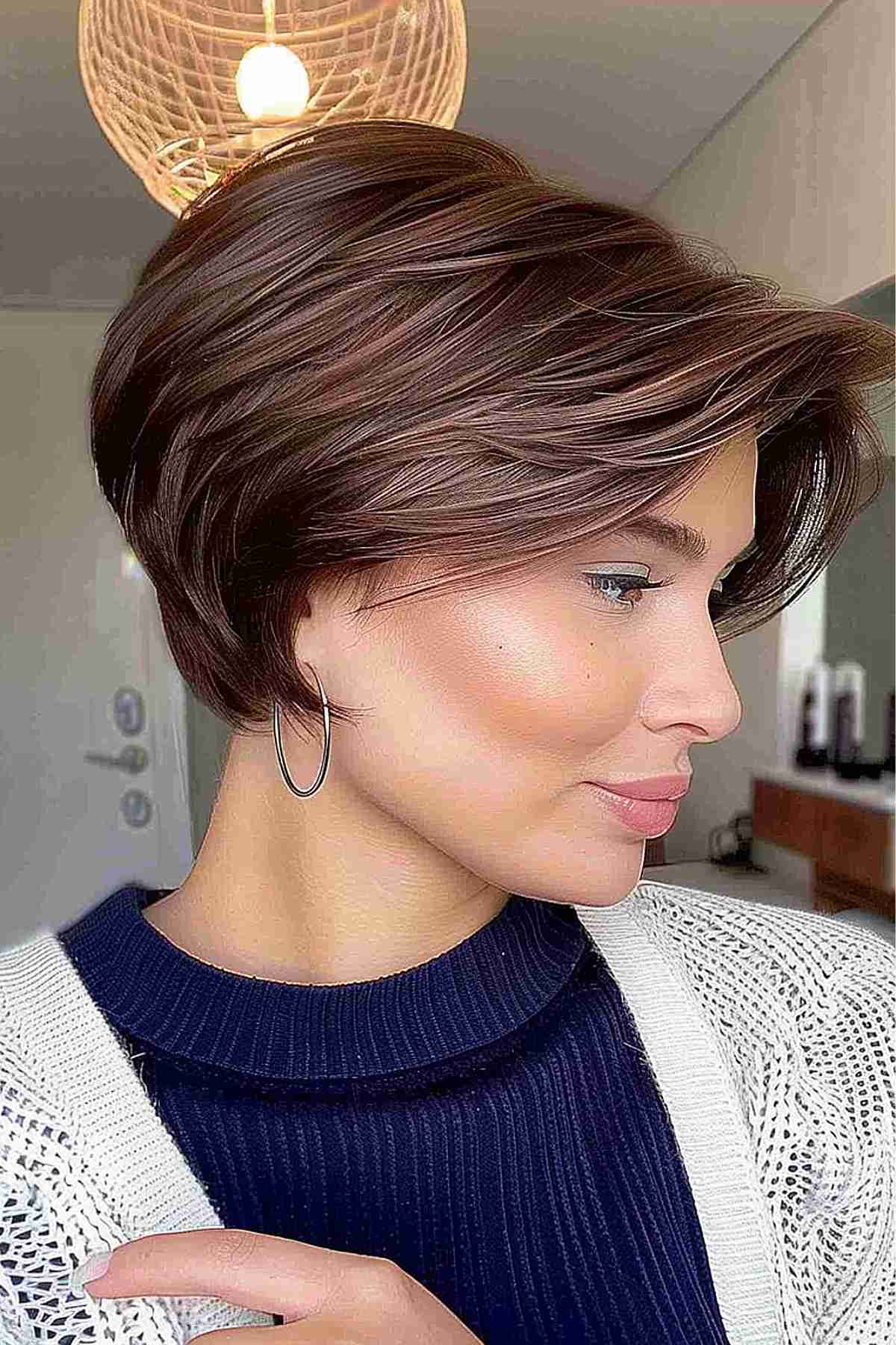 Stylish long lixie bob hairstyle featuring gradient brown highlights