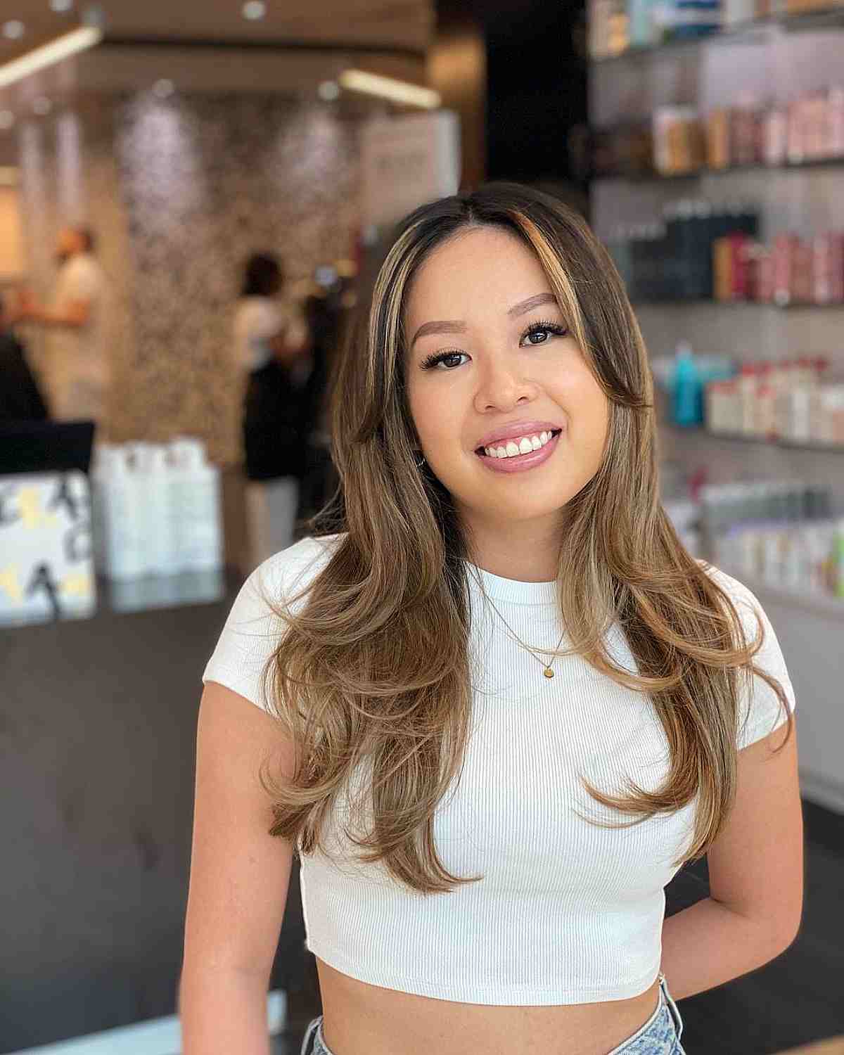 Elegant Long Blowout Straight Hairstyle with Soft Curtain Bangs