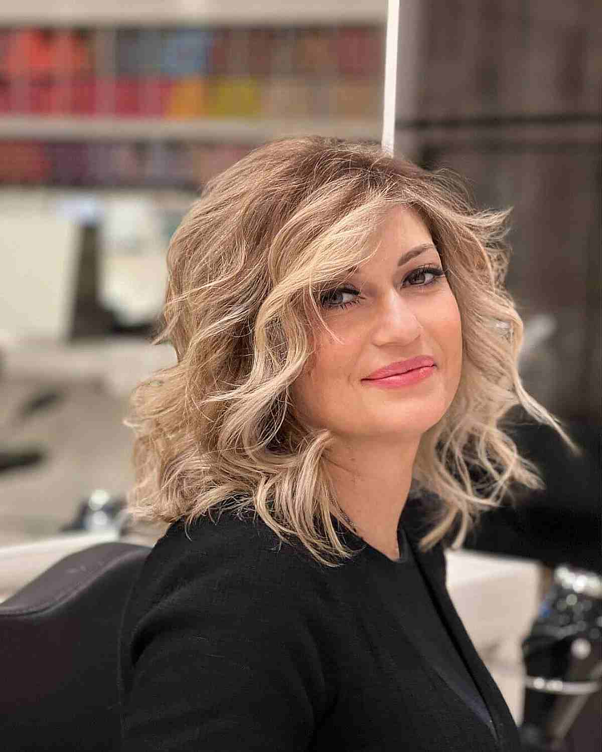 Mid-Length Elegant Long Bob Haircut for Ladies in Their 50s