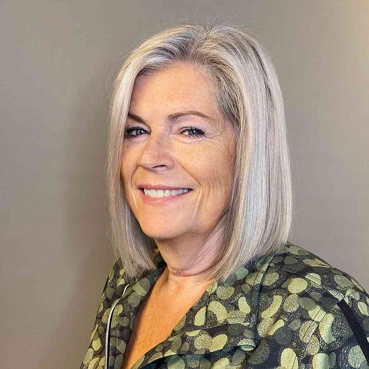 Elegant Long Bob Hairstyle for Mature Women with Straight Locks