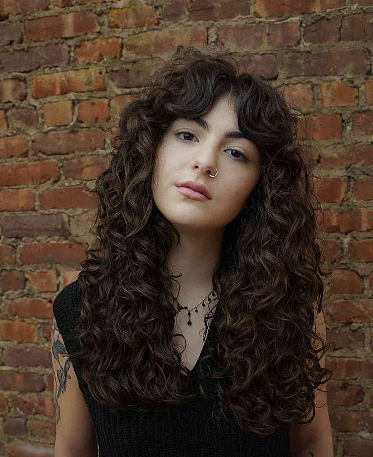 Elegant Long Diffused Curls and curtain bangs for women with long hair