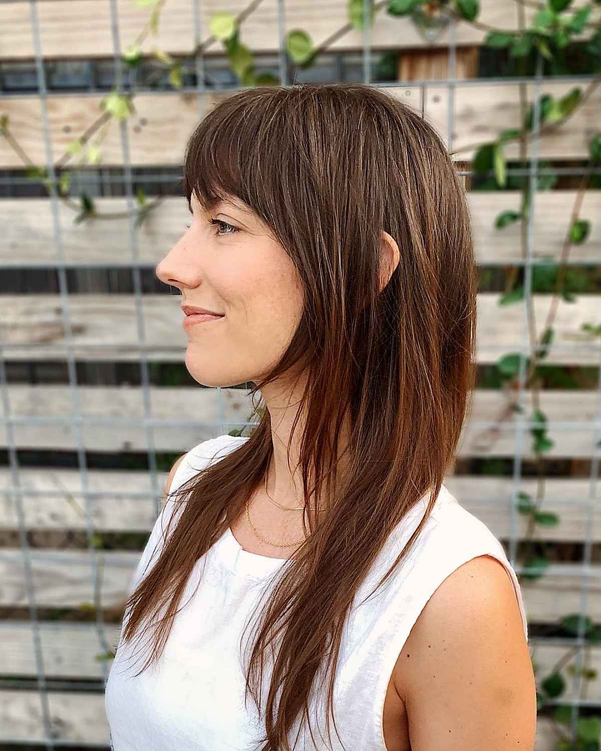 Elegant Long Hair with Face-Framing Bangs