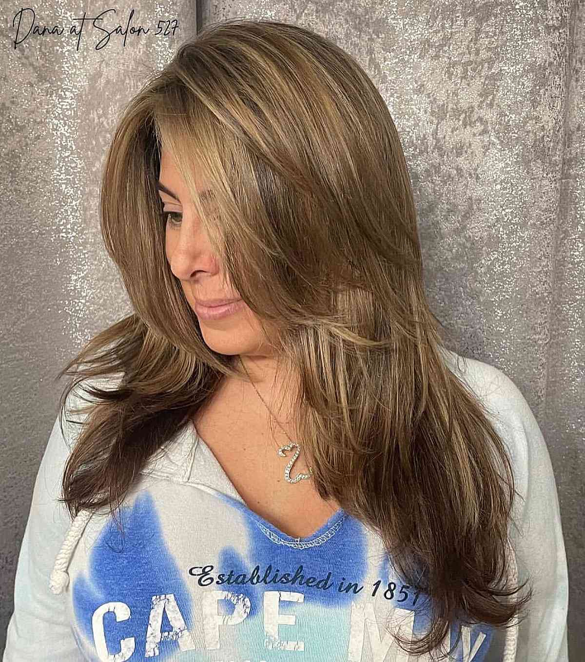 Elegant Long Haircut with Face-Framing Layers for women past 40