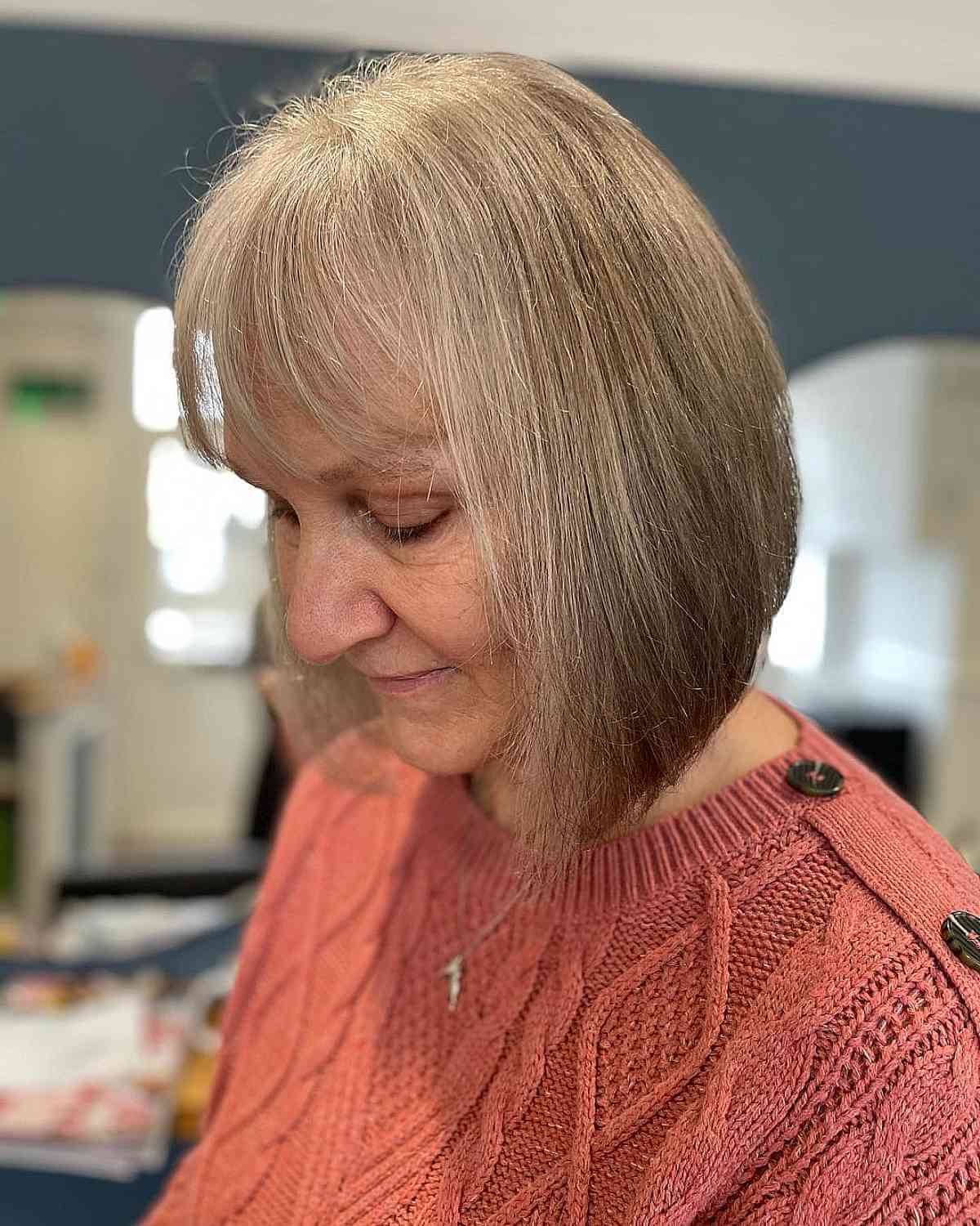 Elegant Long Inverted Bob with Bangs for Fine Haired Women Fifty and Up