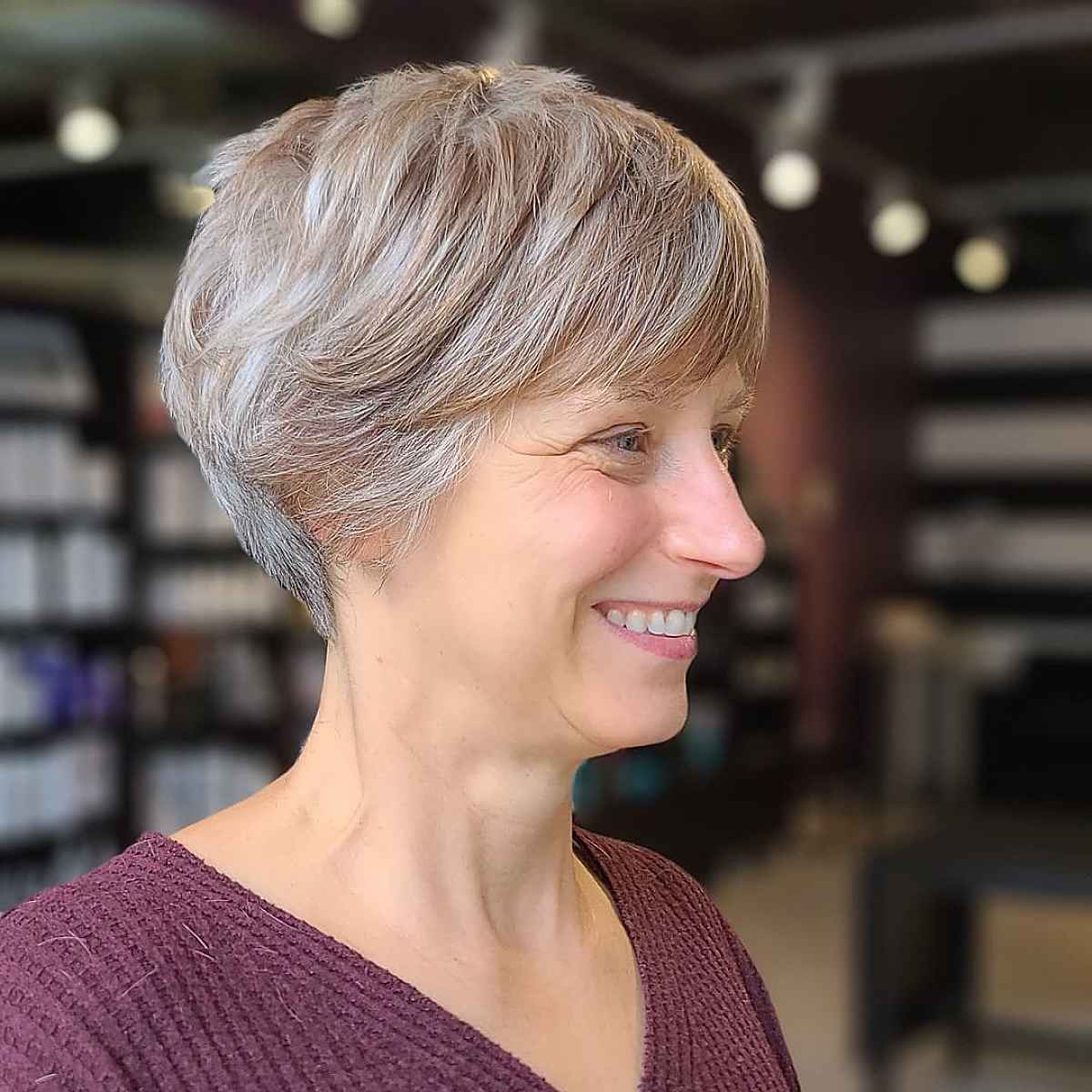 Elegant Long Pixie with Bangs for Sophisticated Women with Silver Hair