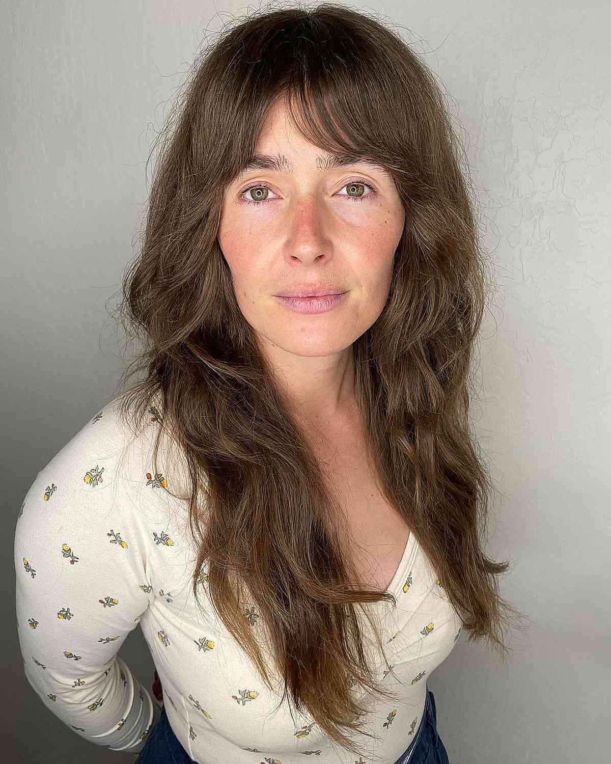 Elegant Long Shag Haircuts for Women with Elongated Faces Over Forty