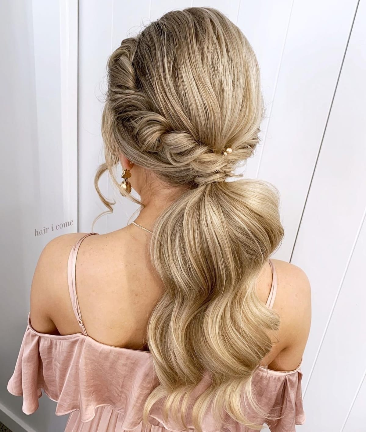 Elegant low twisted ponytail