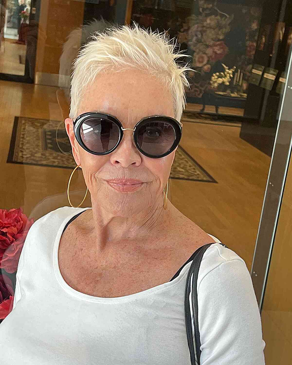 Elegant Pearl Blonde Pixie Cut for older ladies with glasses