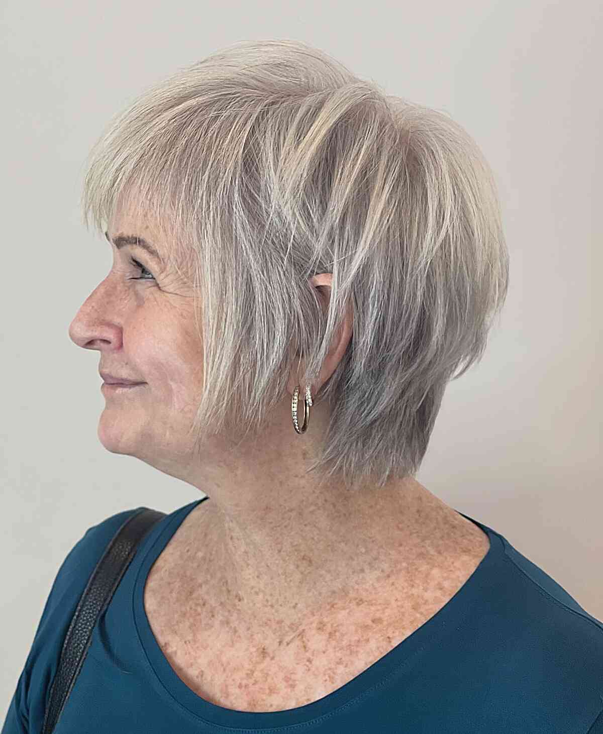 Elegant Pixie Crop with Delicate Layers on Women Aged 70 and Up