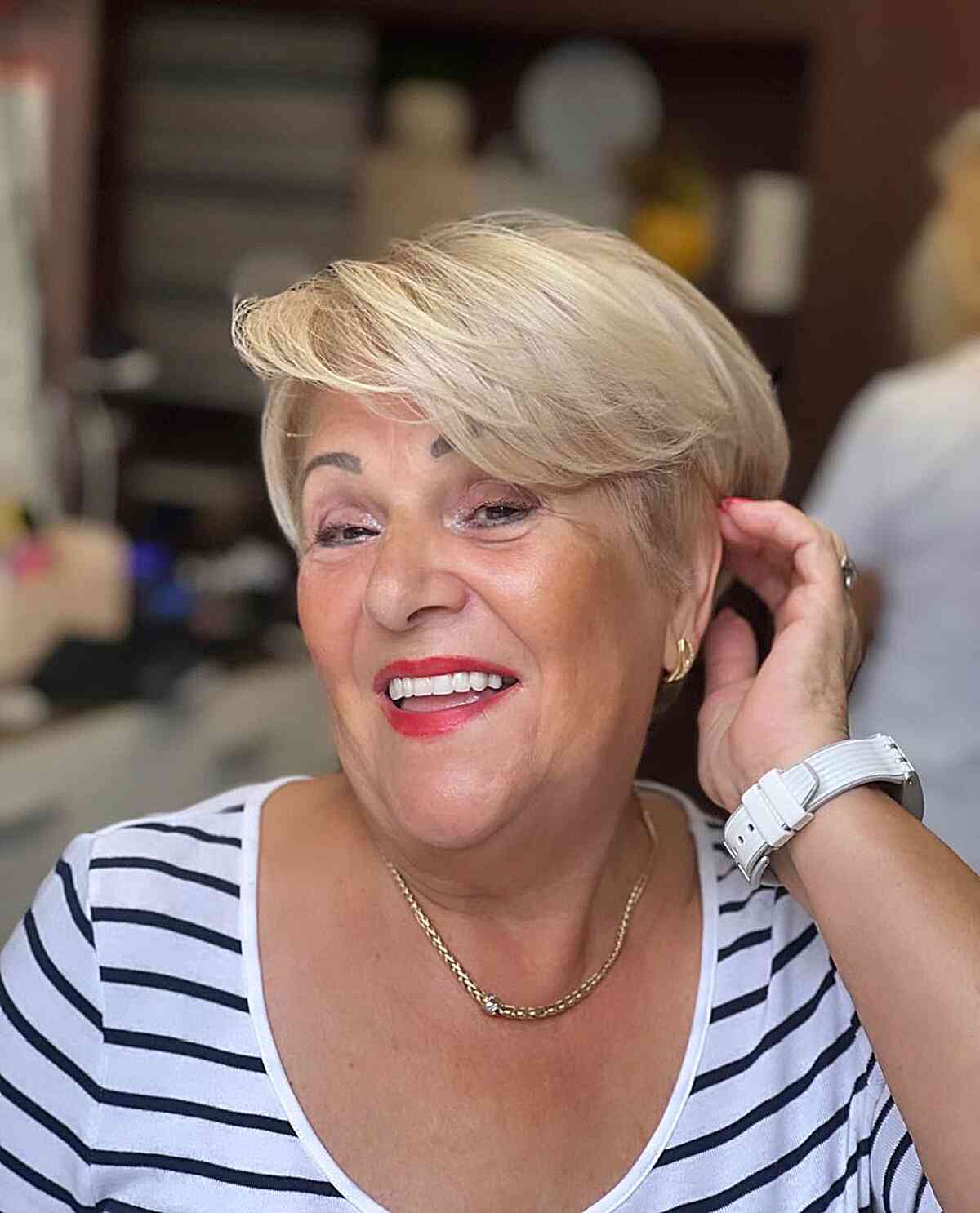 Elegant Pixie Blonde Hair with Side-Swept Bangs for Women Aged 70