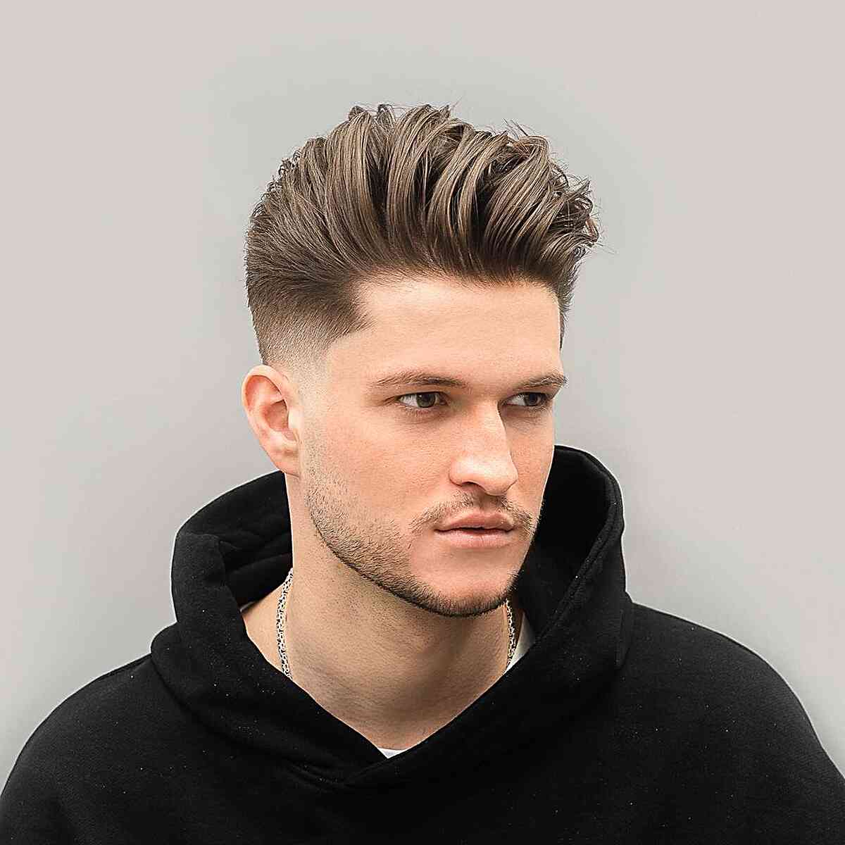 Sophisticated Pompadour Prep Hairstyle for Men with Thick Hair