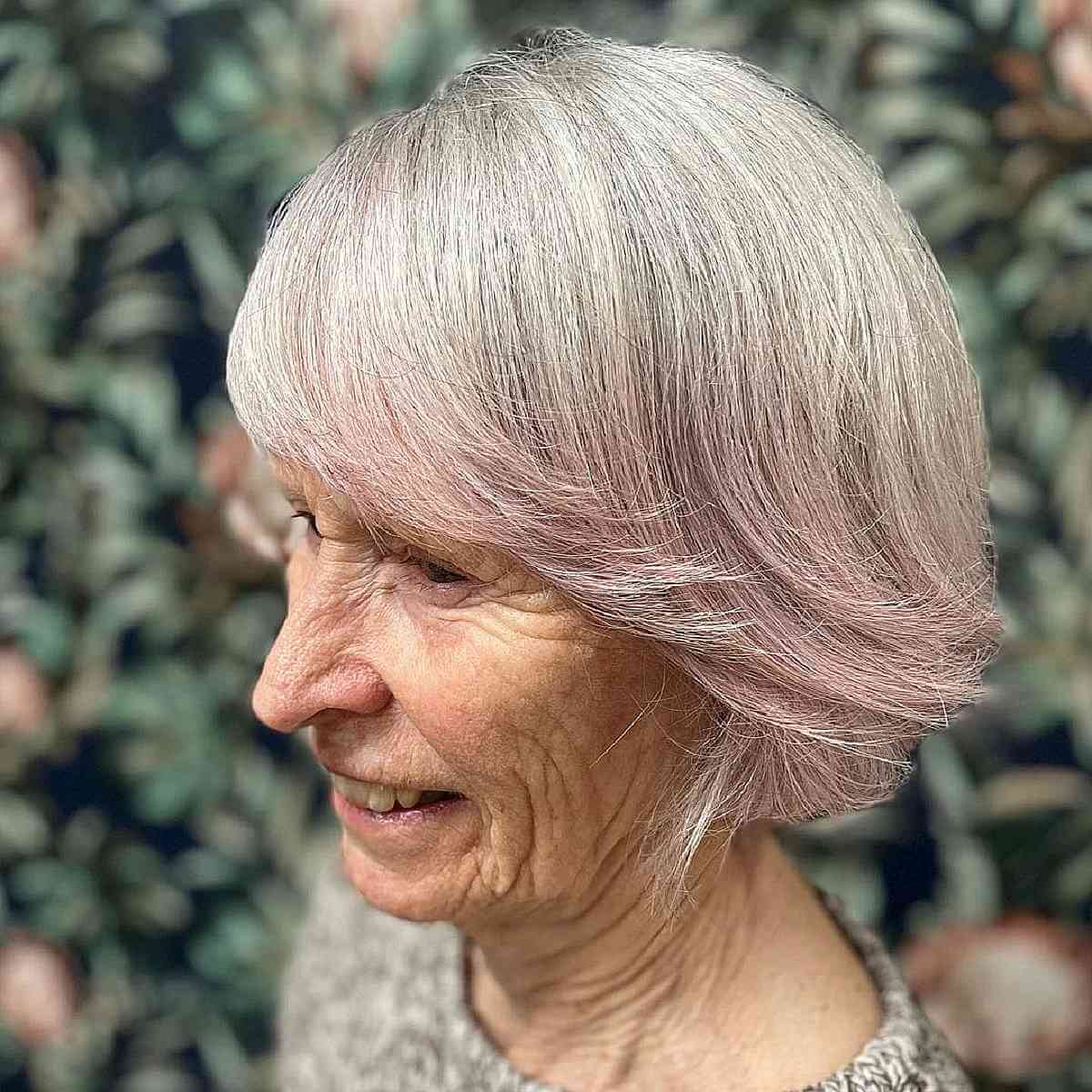 Elegant Razor Cut Bob Featuring Full Bangs