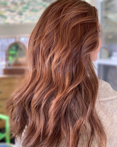 Elegant Red Hue with Caramel Balayage