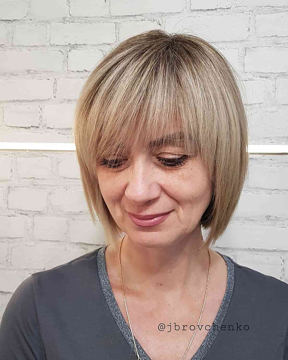 Elegant Round Bob with Delicate Bangs