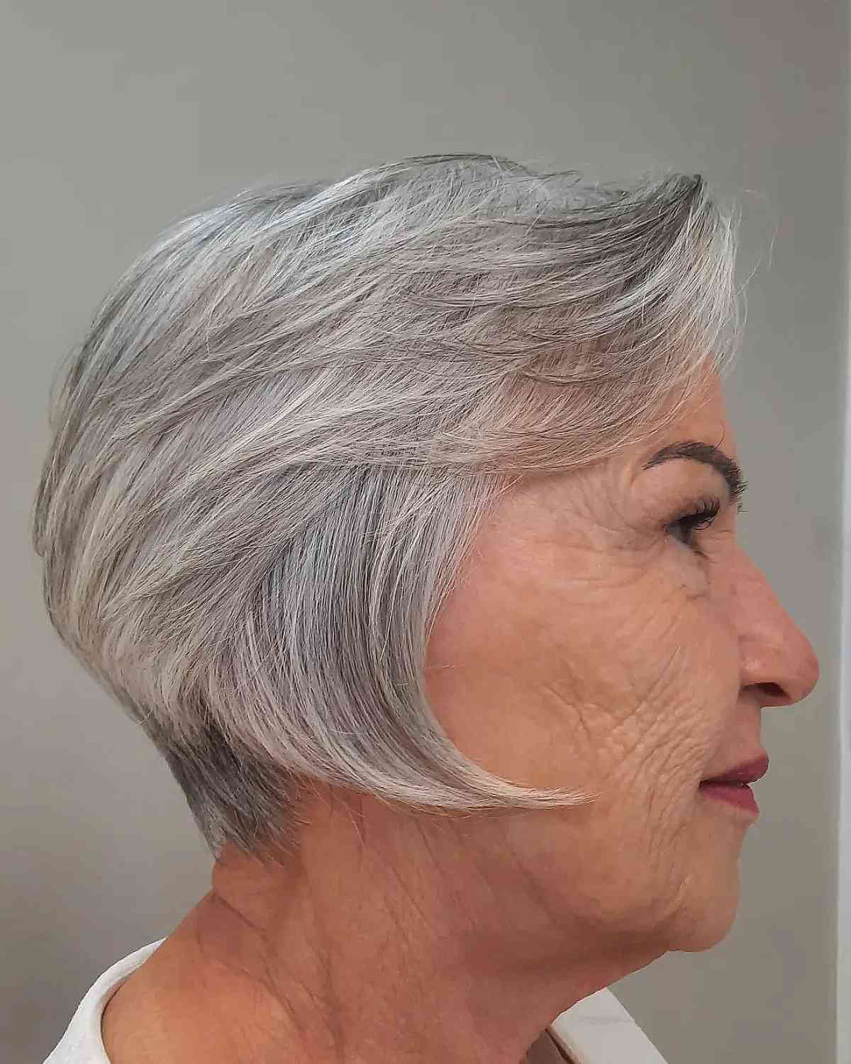 Elegant Silver Feathered Bob for 70-Year-Olds with Fine Hair