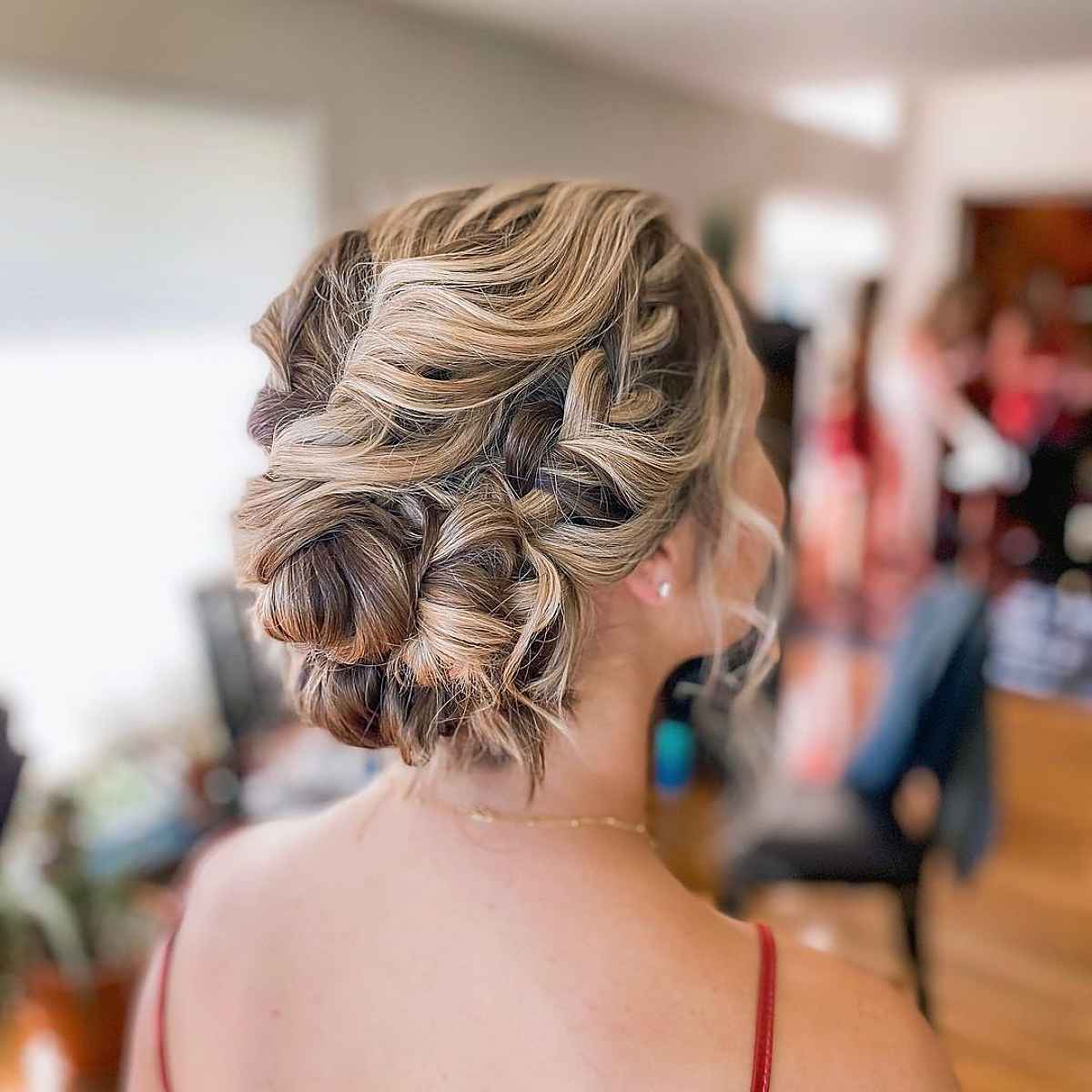 Elegant Dimensional Prom Updo with a Side Braid