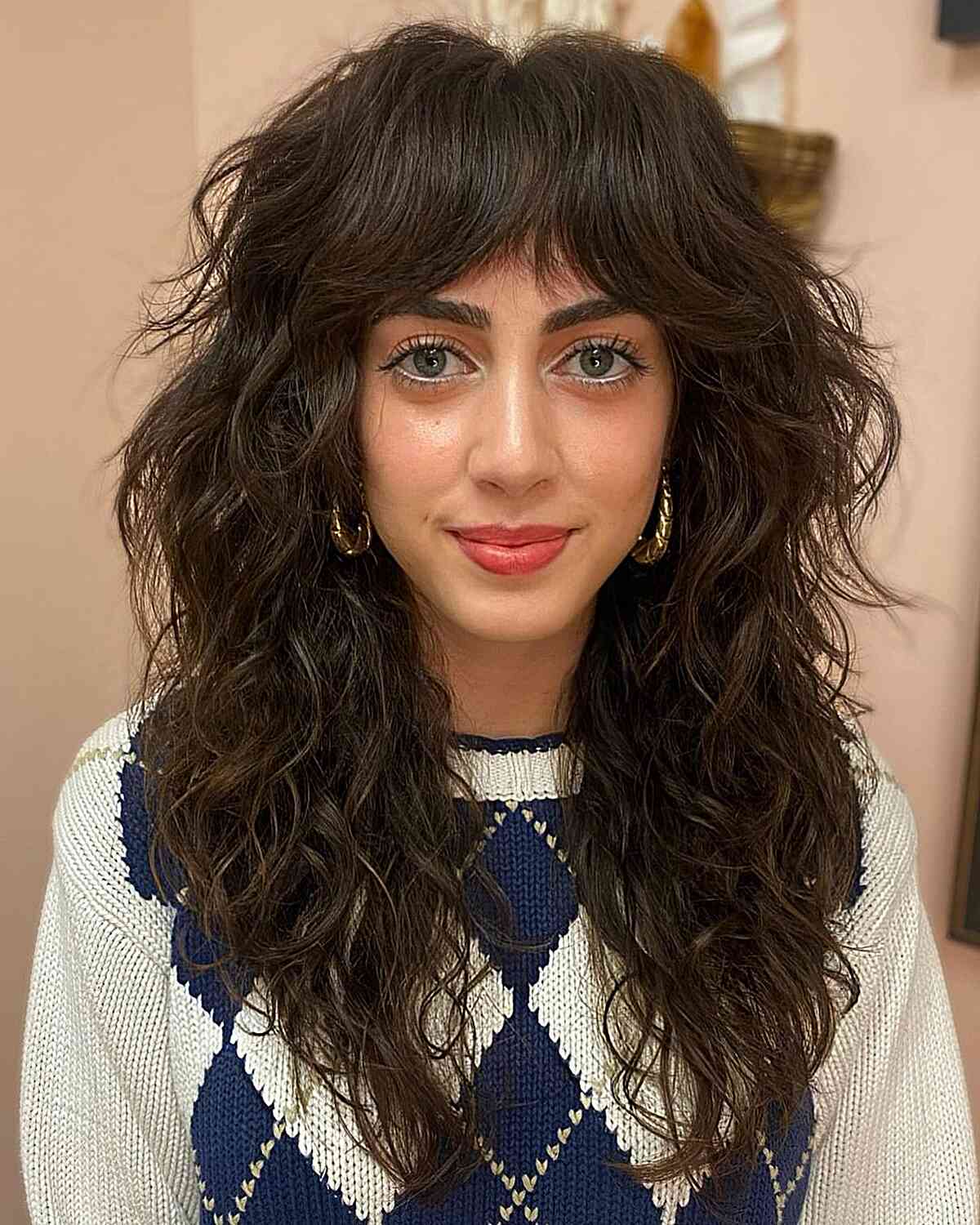 Long Textured Wispy Shaggy Haircut with Wavy Bangs