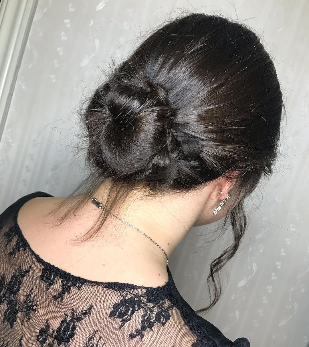 Elegant Twisted Chignon Low Bun for Short Hair