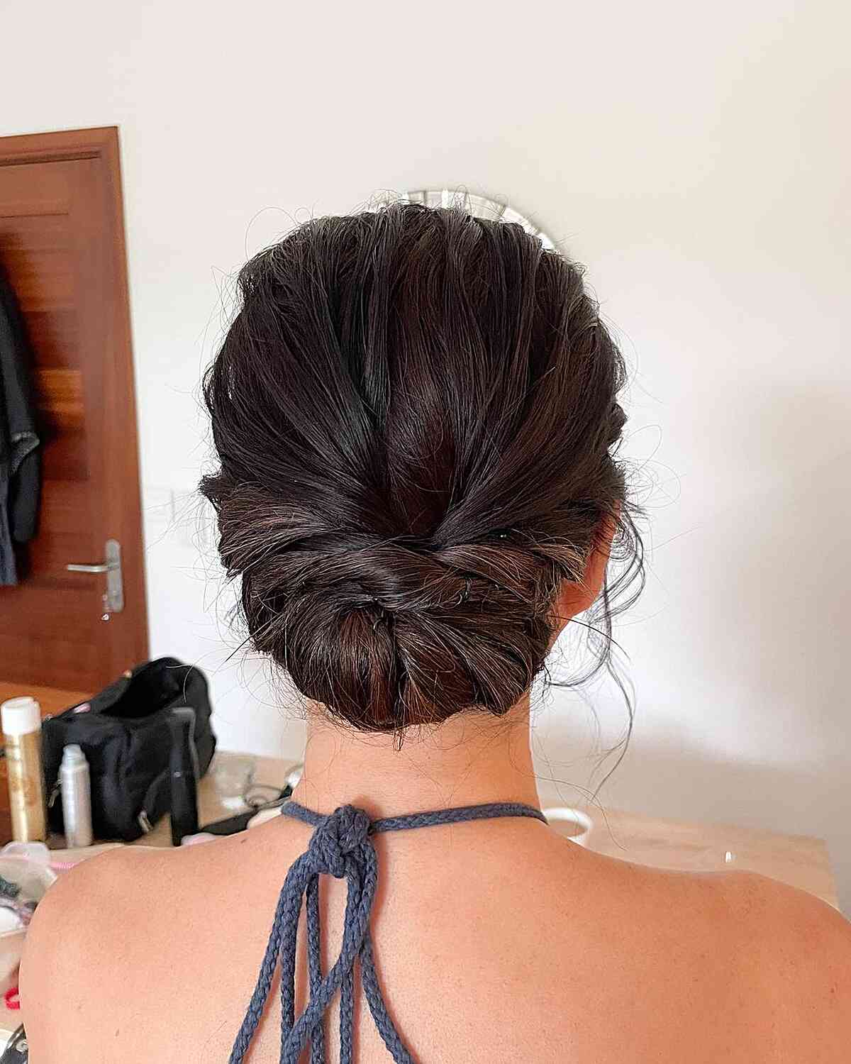 Elegant Soft Twisted Updo for Mother of the Bride