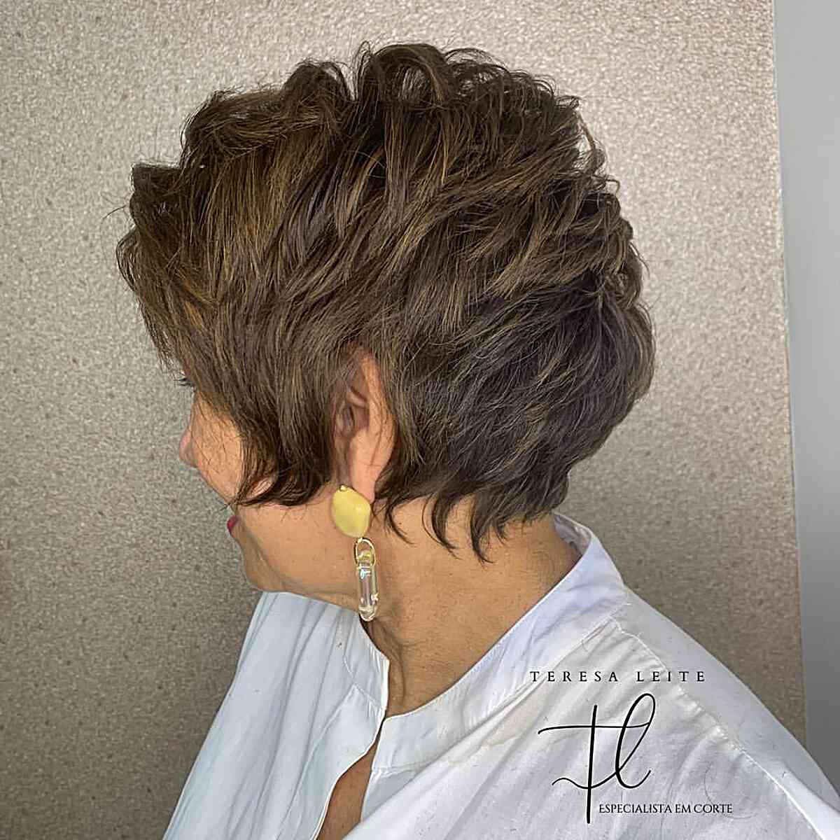 Short-Length Elegant Pixie Bob with Shorter Layers on mature women in their 50s