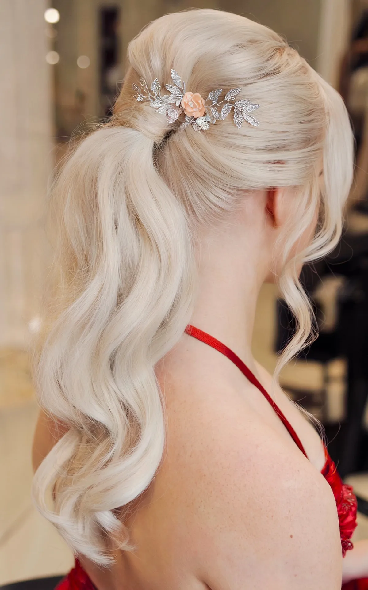 Elegant Wrapped Ponytail with Face-Framing Curls