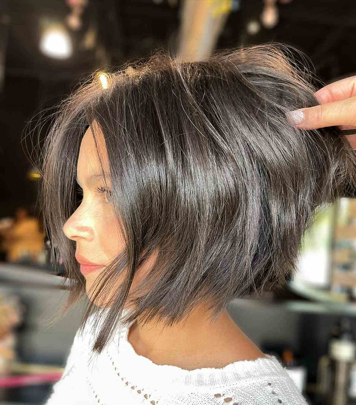 Elegantly Angled Choppy Bob with Layers for Thick Hair