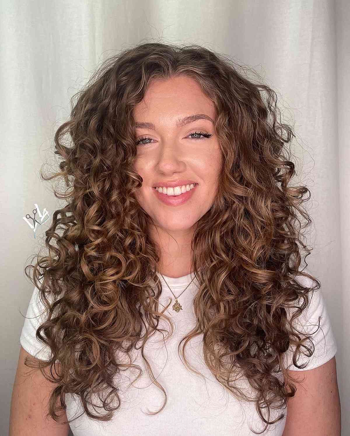 Enhanced Long Layered Cut for Curly Hair for a Wash-and-Go Hairstyle