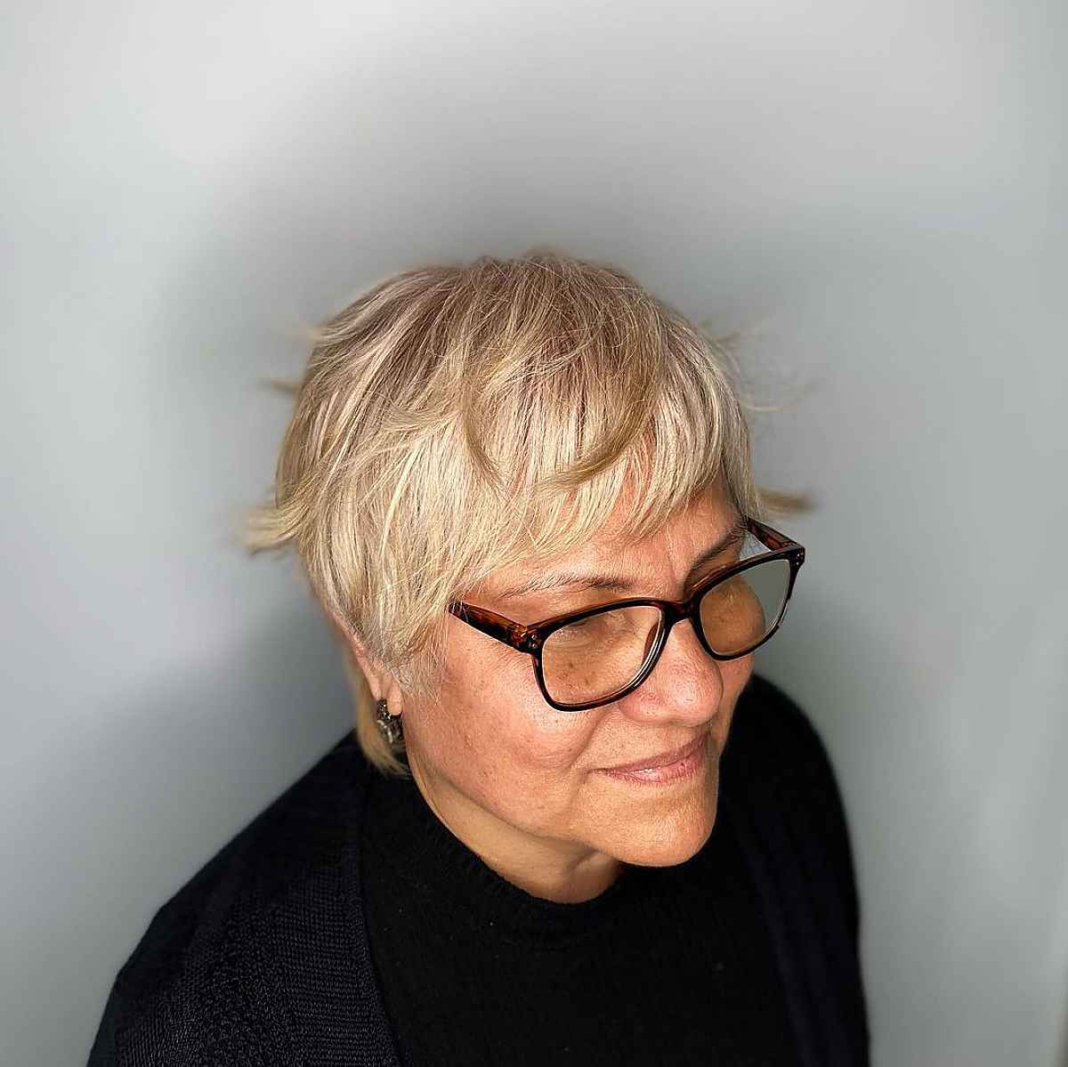 Feathered Bangs on Textured Pixie for Women Over 50 with Fine Hair