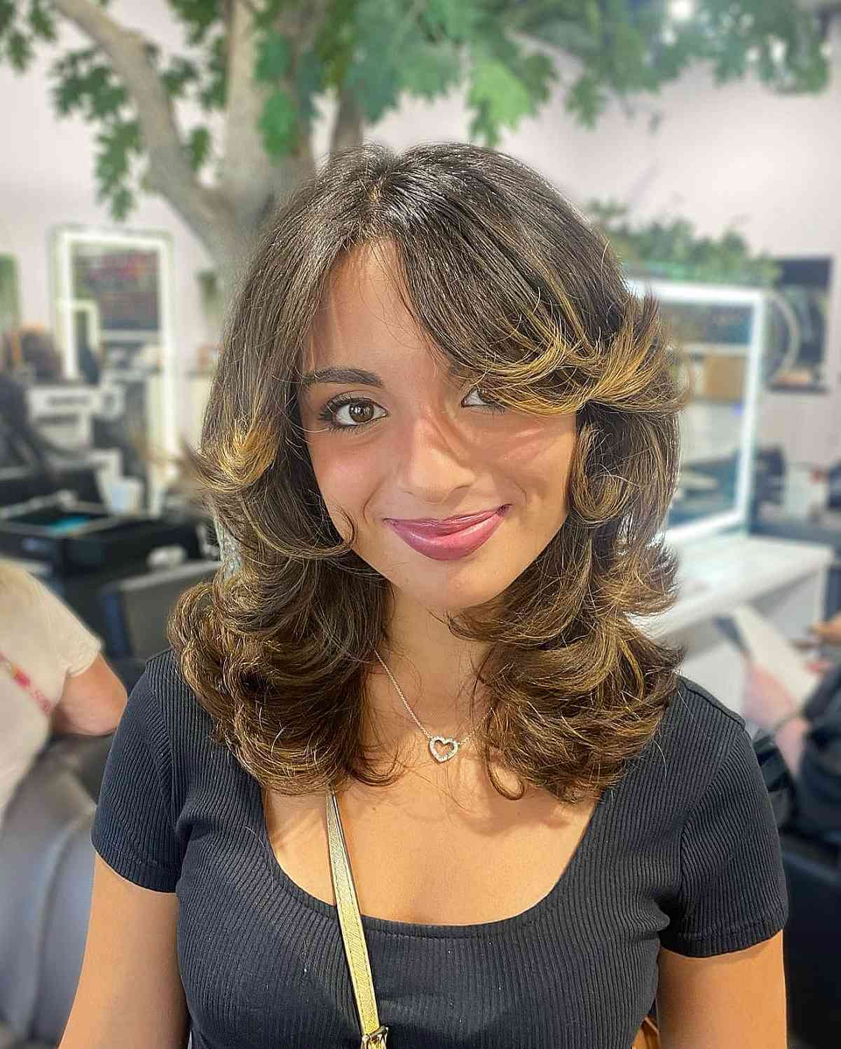 Feathered Layers on Mid-Length Hairstyles