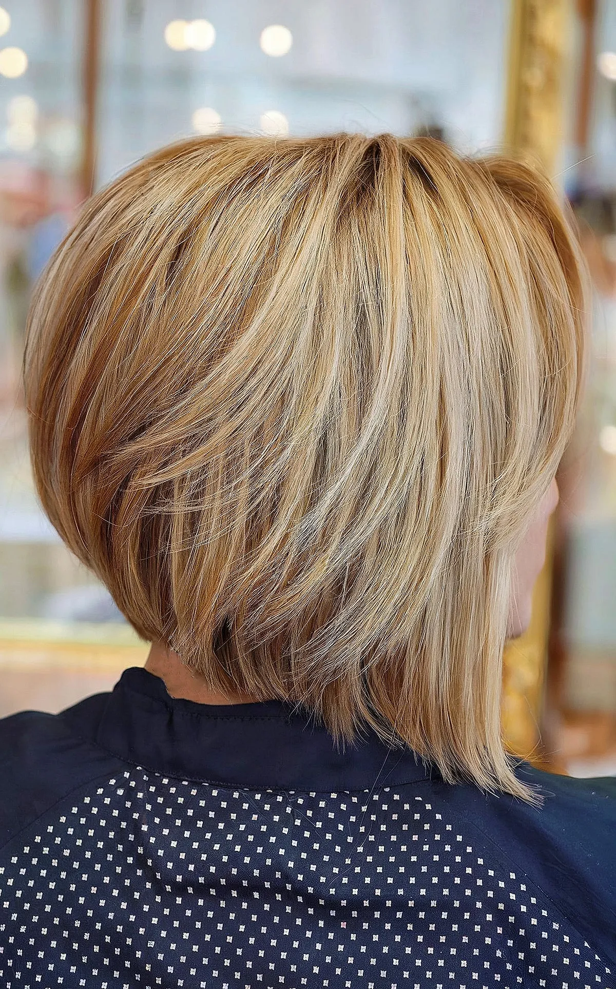 Feathered Layers in an Angled Bob Cut