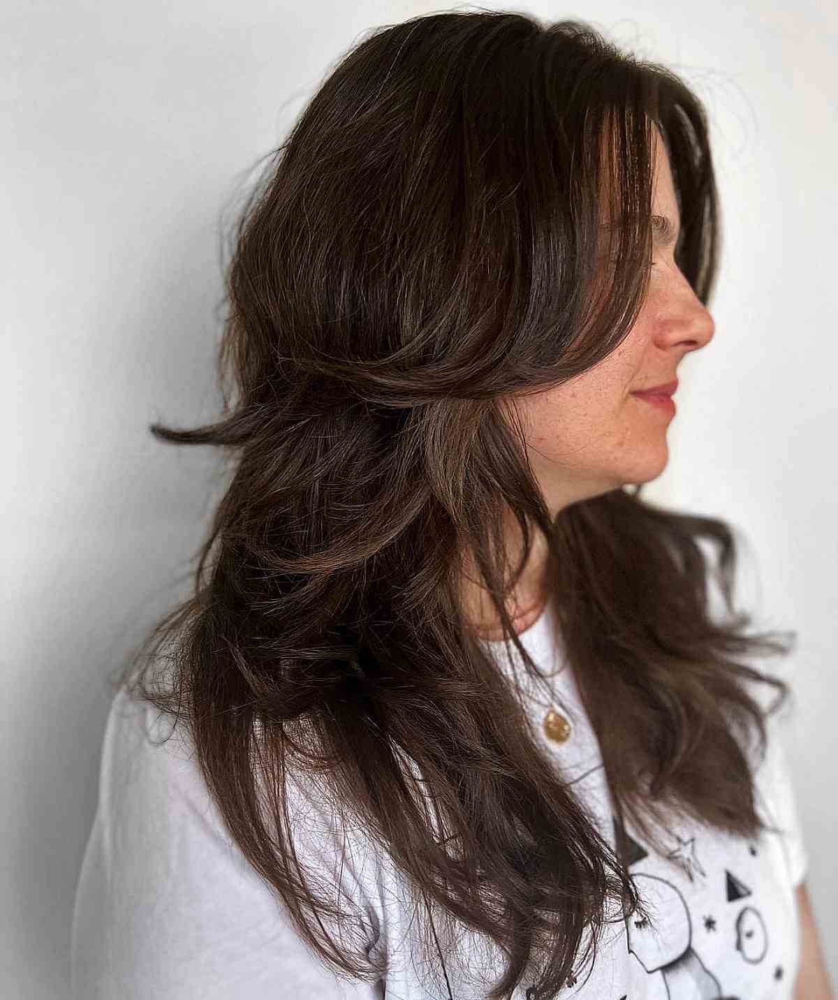 Feathered Layers on Shaggy Hair on a Woman in Her 40s