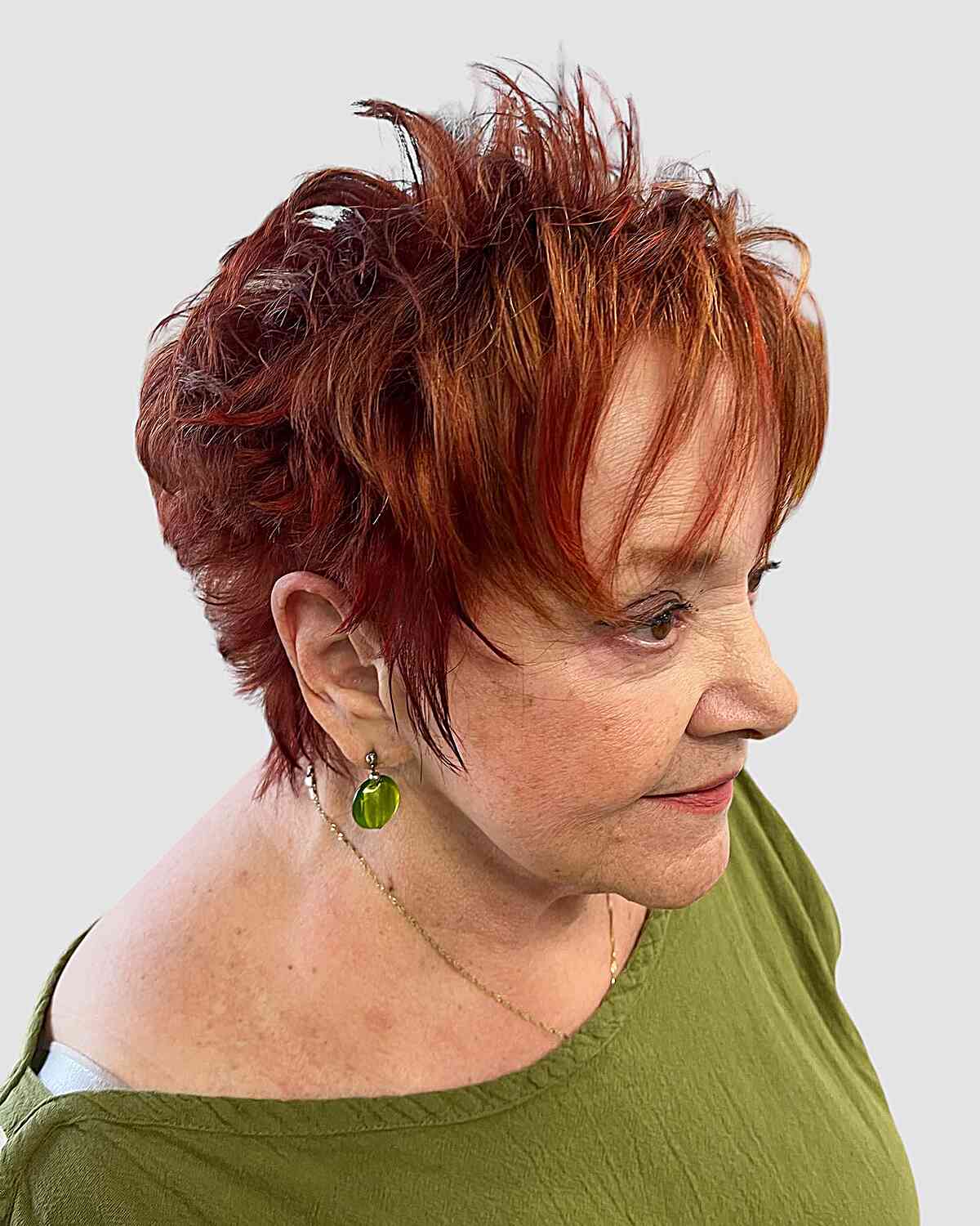 Wash and Wear Feathered Spiky Pixie Hairstyle with Piece-y Bangs for Women Aged Fifty