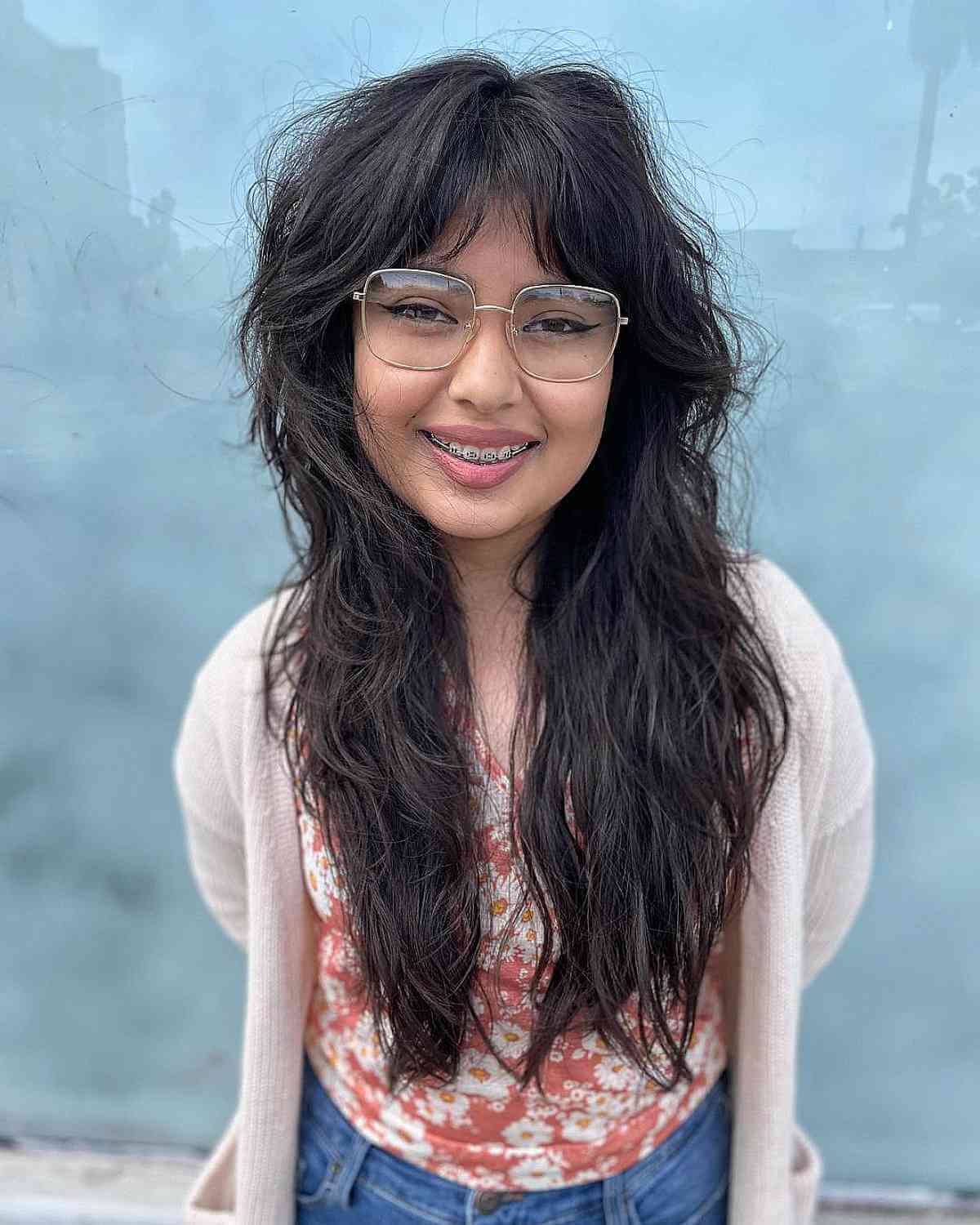 Feathery Bangs and Choppy Layers on Messy Shaggy Hair