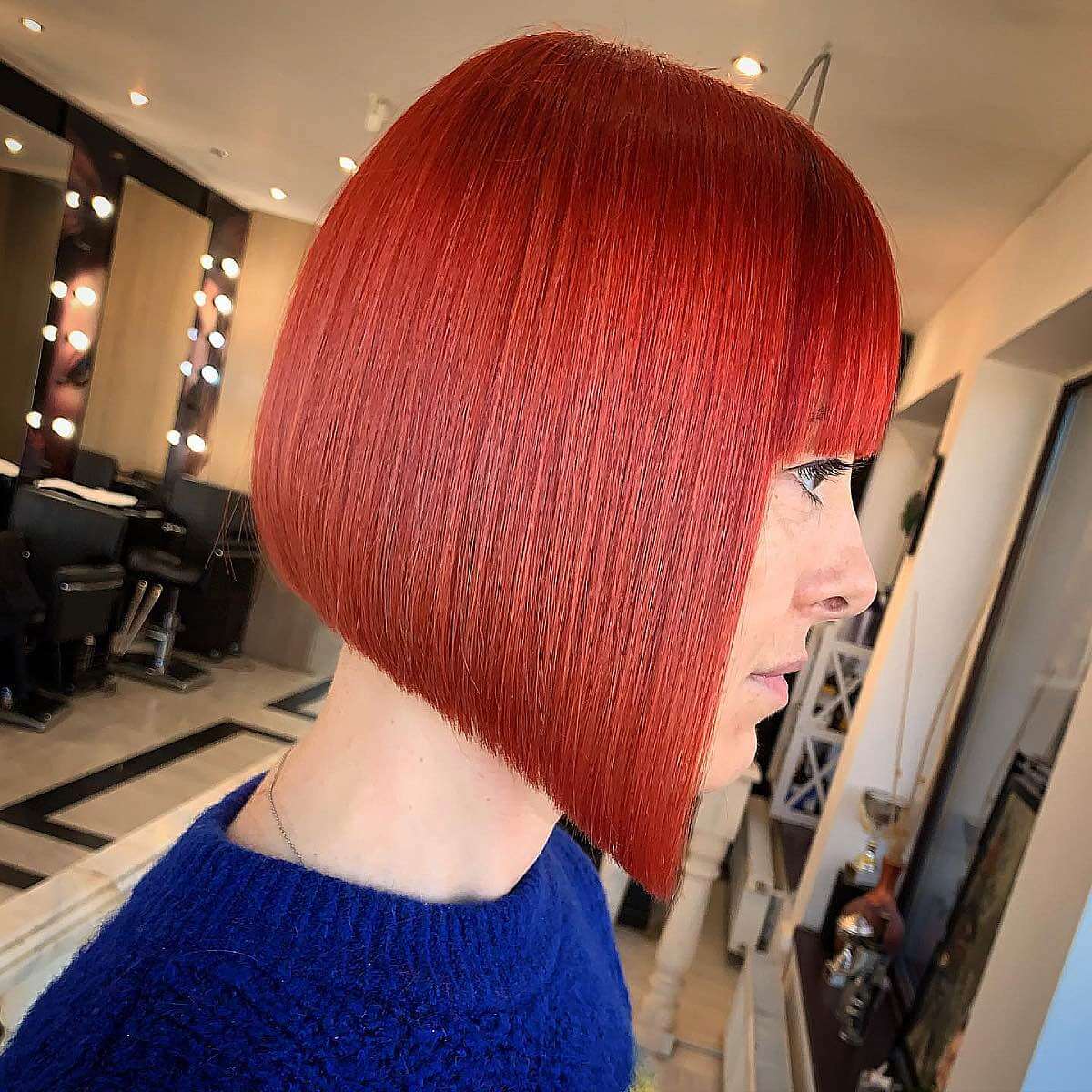 vibrant brick red hairstyle for straight hair