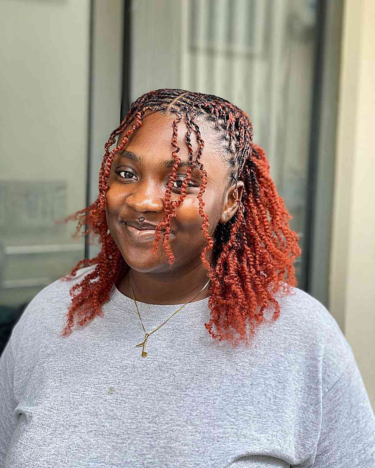 Fiery-Orange Micro Twists for Medium Hair