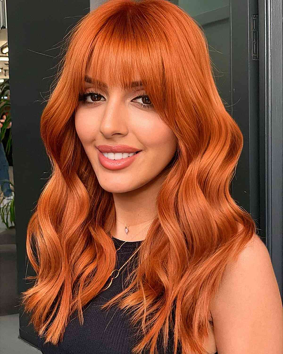 Fiery Sunset Red Hair with Wispy Bangs