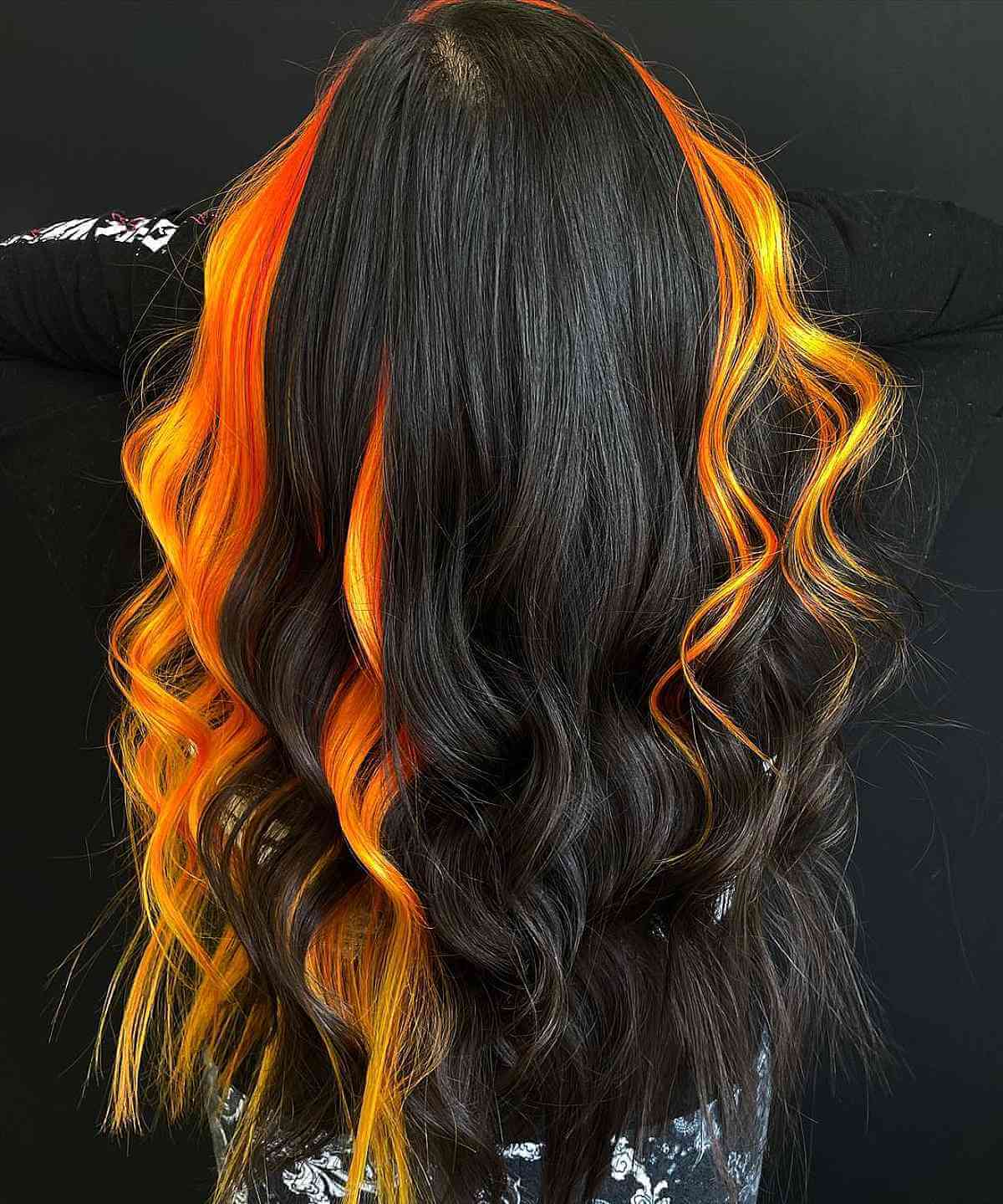 Flowing Black Tresses with Striking Yellow Accents