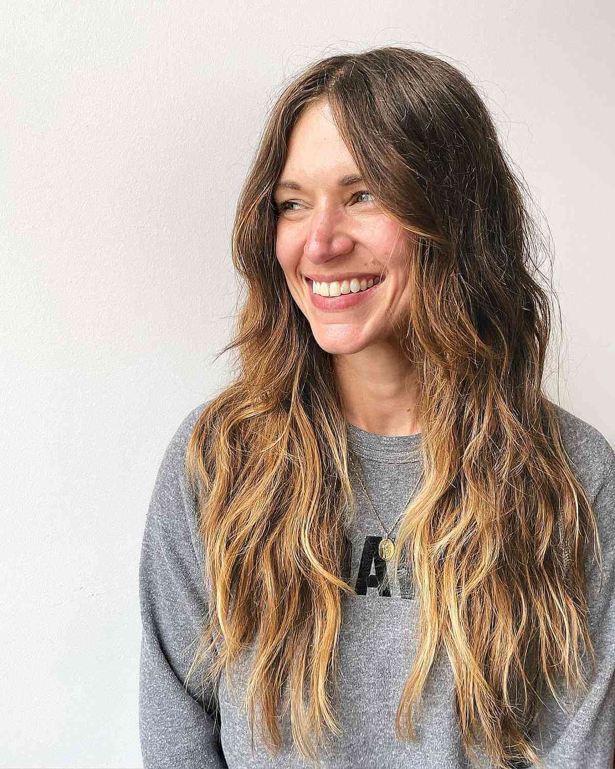 Wash-and-Go Flowing Layered Locks with Gentle Beach Waves