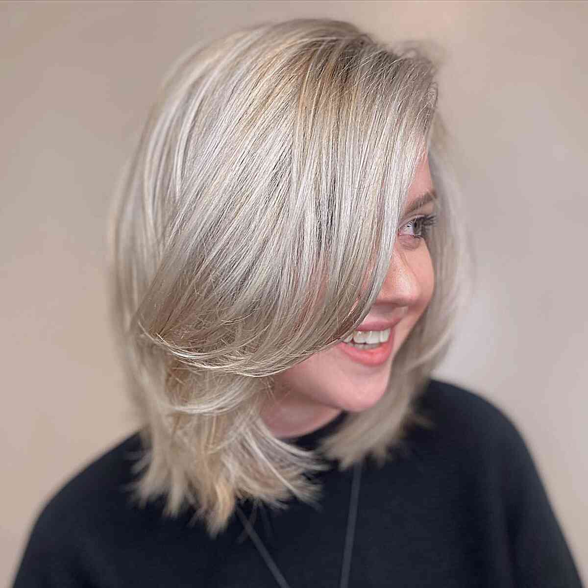 Flowing Soft Layers on Medium-Length Hair for Oval Faces