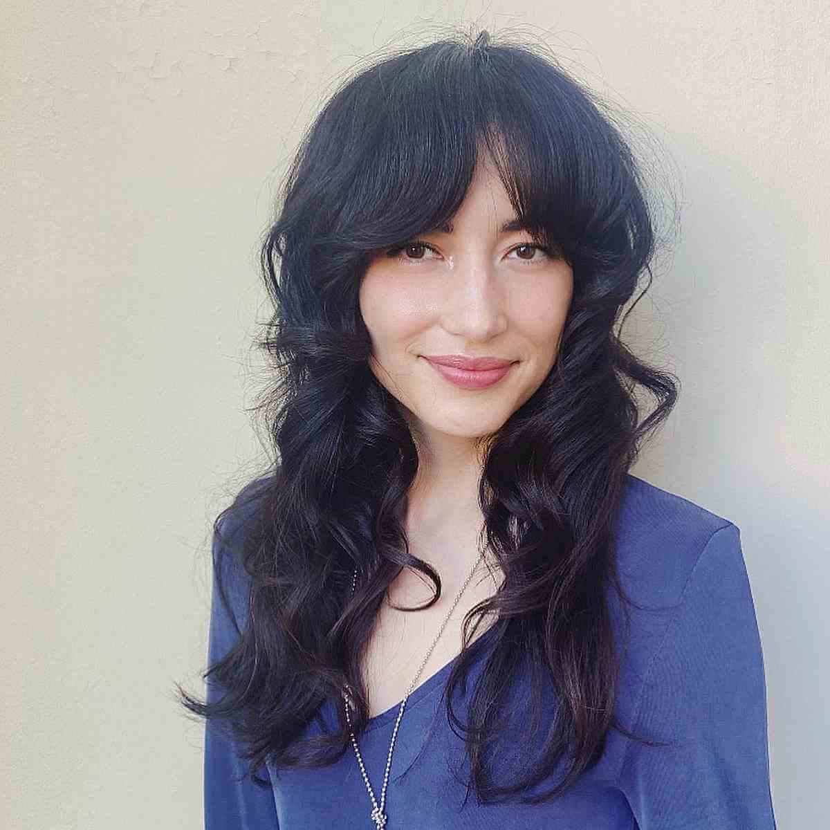 Flowing Wavy Hair with Bottleneck Feathered Fringe