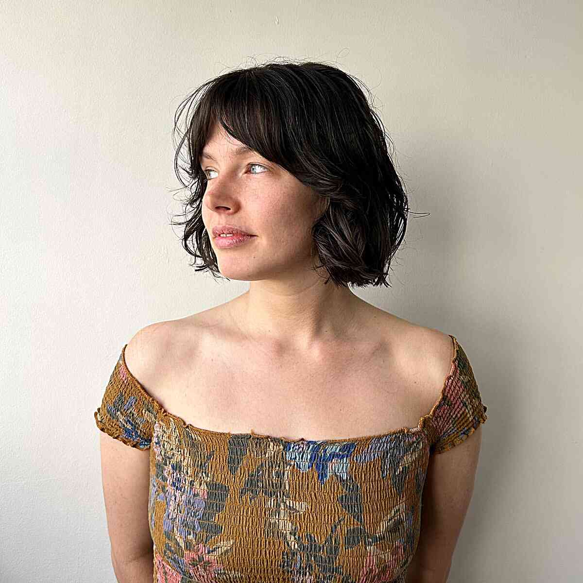 French Bobbed Hairstyle Featuring Middle-Parted Bangs