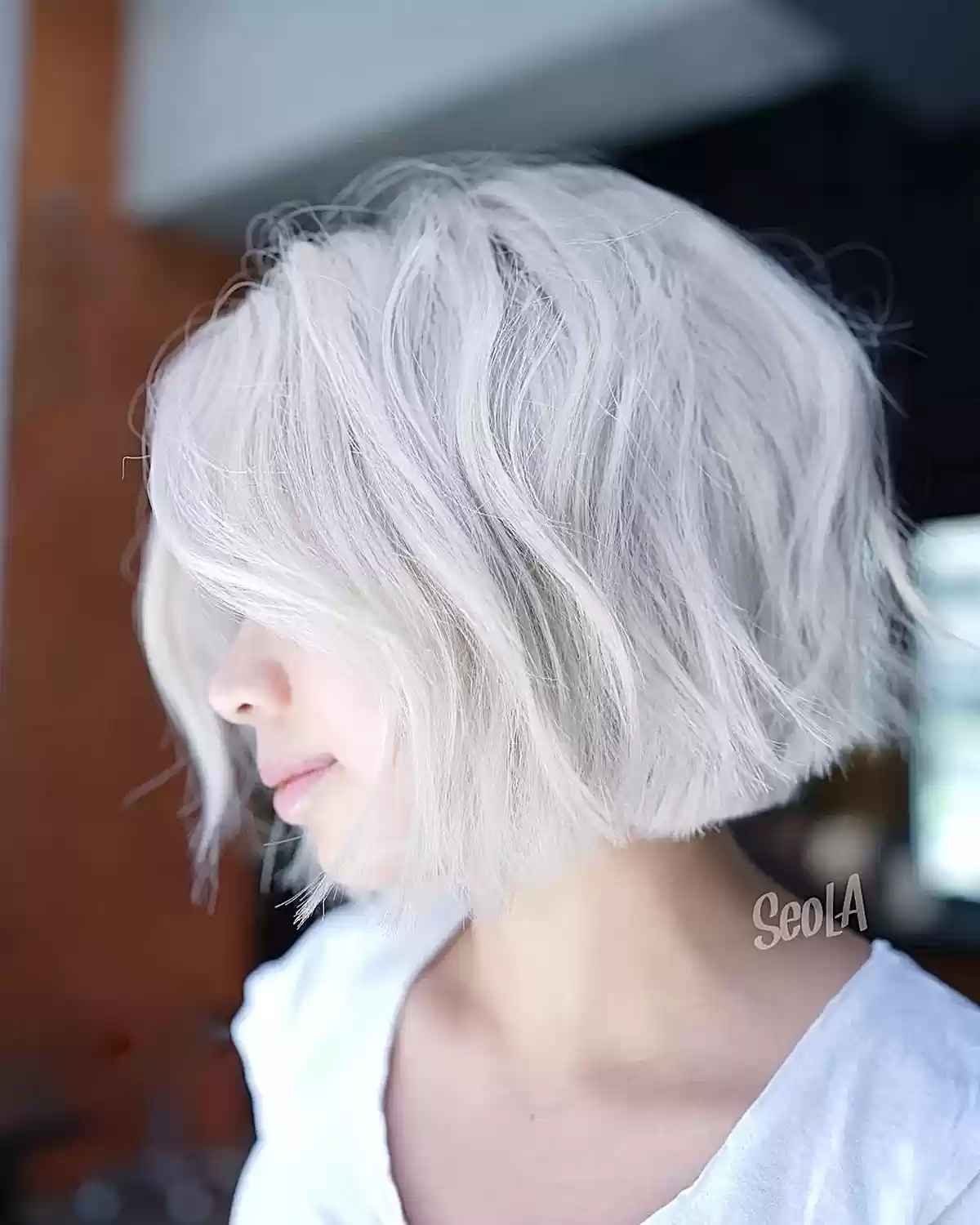 Short Frosty White Blonde Blunt Cut for women with short hair