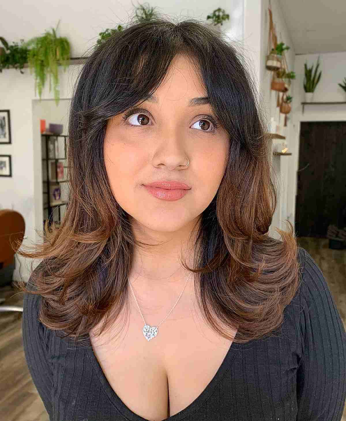 Medium Full and Lively Layers with Soft Curtain Bangs