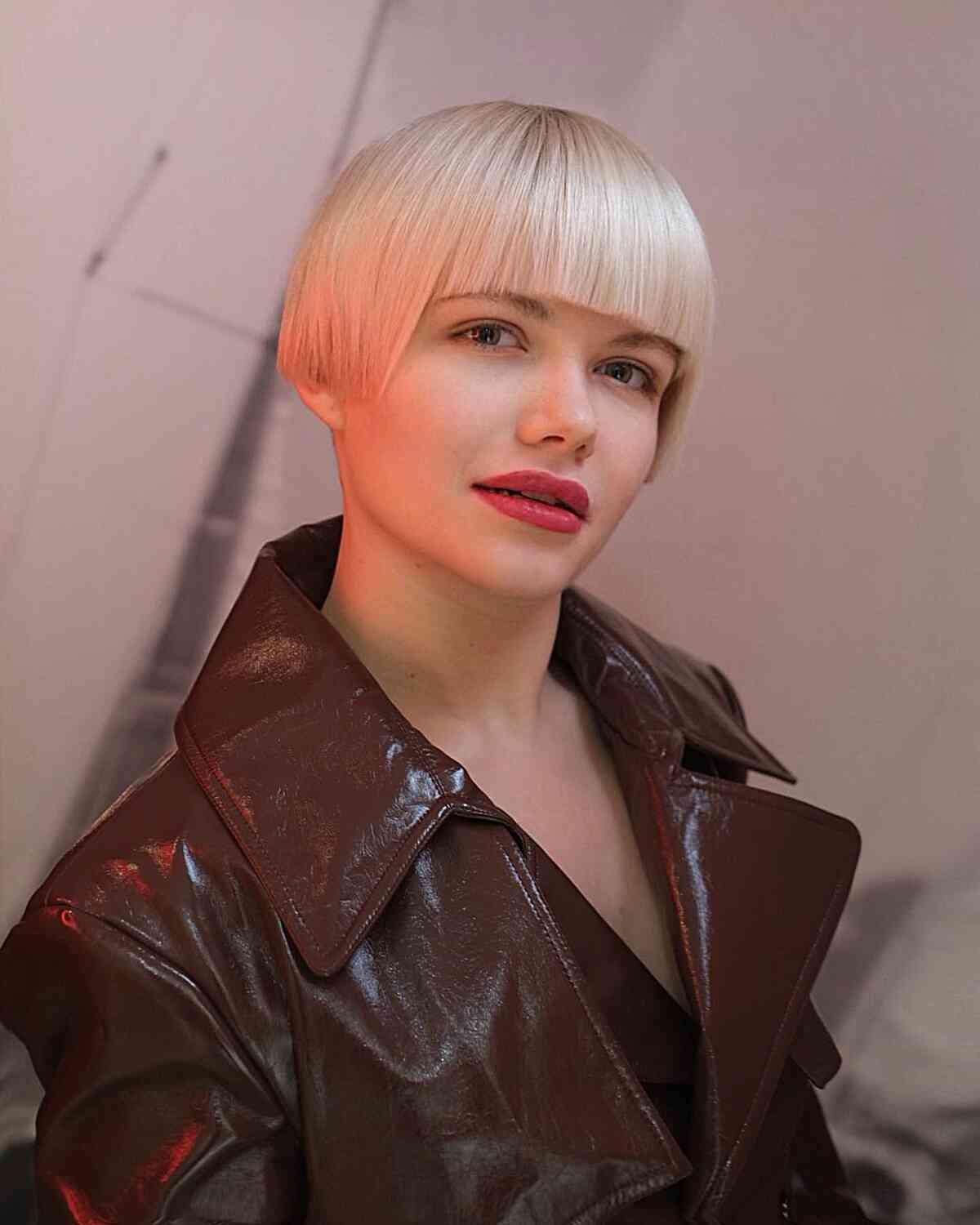 Ear-Length Futuristic Bob Cut with Bangs