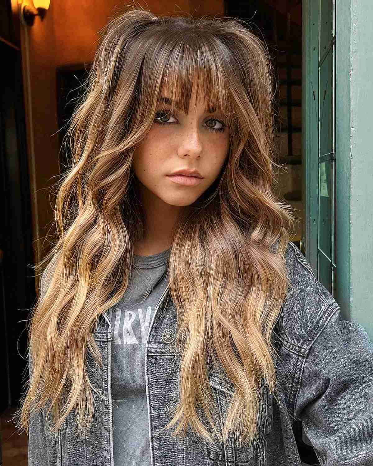 Generously Layered Shag with Blonde Balayage and Fringe