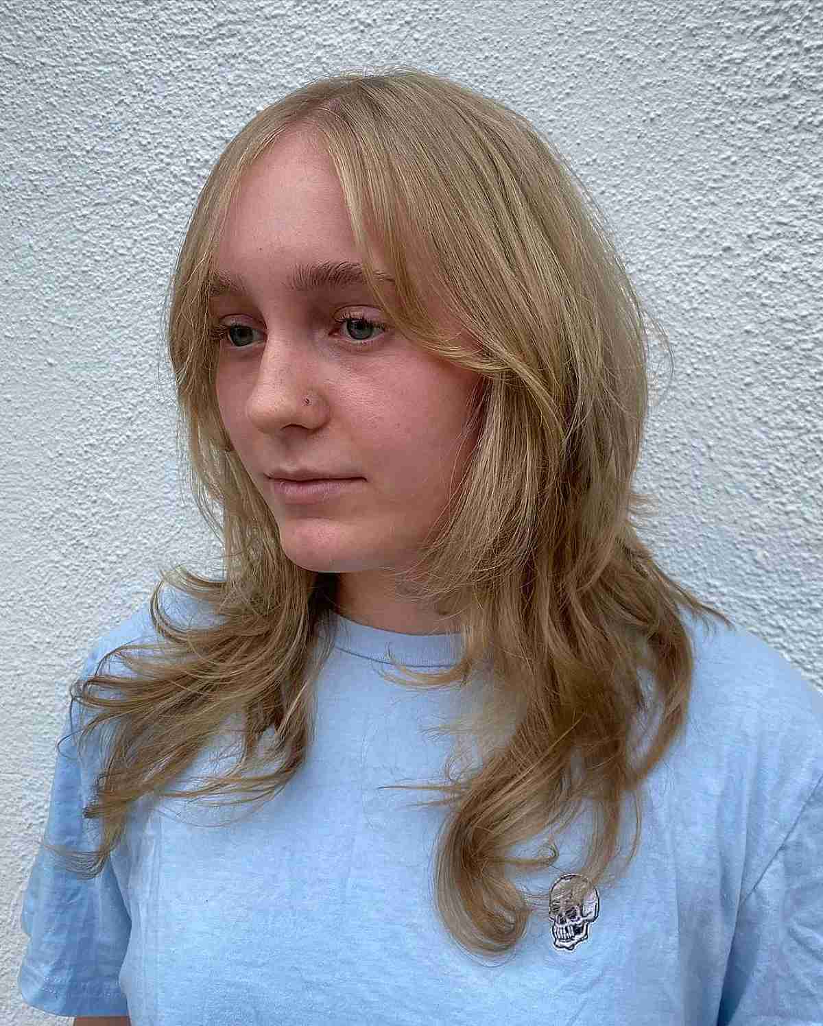 Gentle Wavy Shaggy Layers with a Framing Effect for Thinning Hair