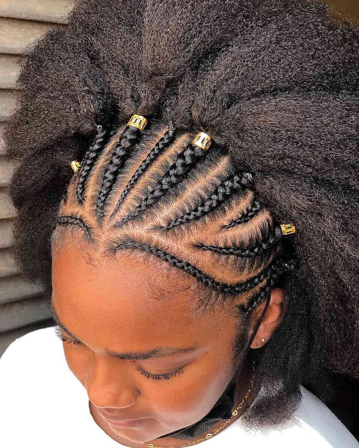 Ghana Braids Adorned with Beads and an Afro