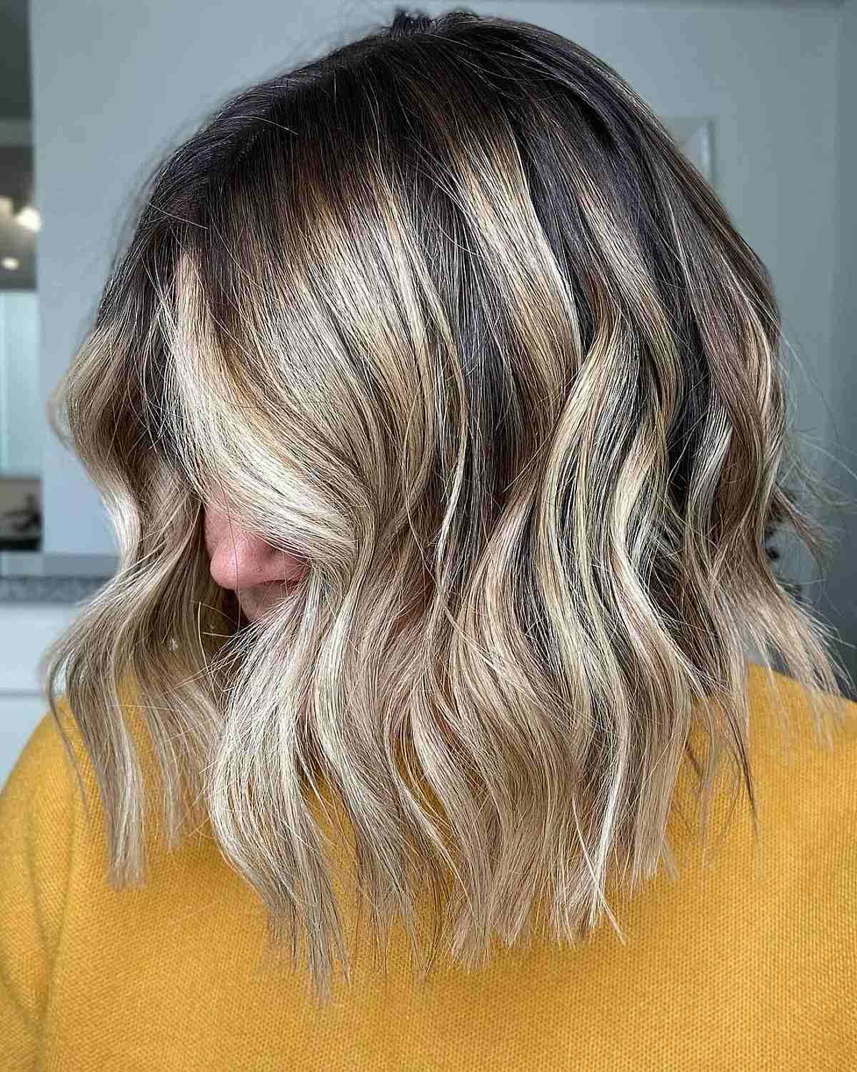 Golden Balayage Highlights with Bold Lowlights on Dark Hair