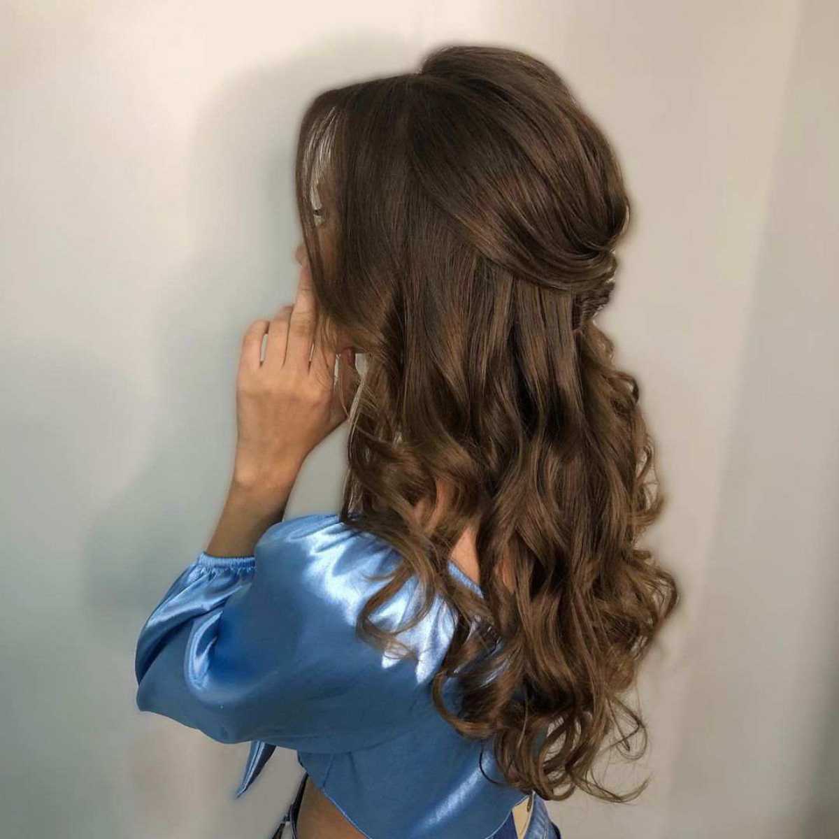 Half-Down Center-Part Hairstyle with Face-Framing Curls for Prom