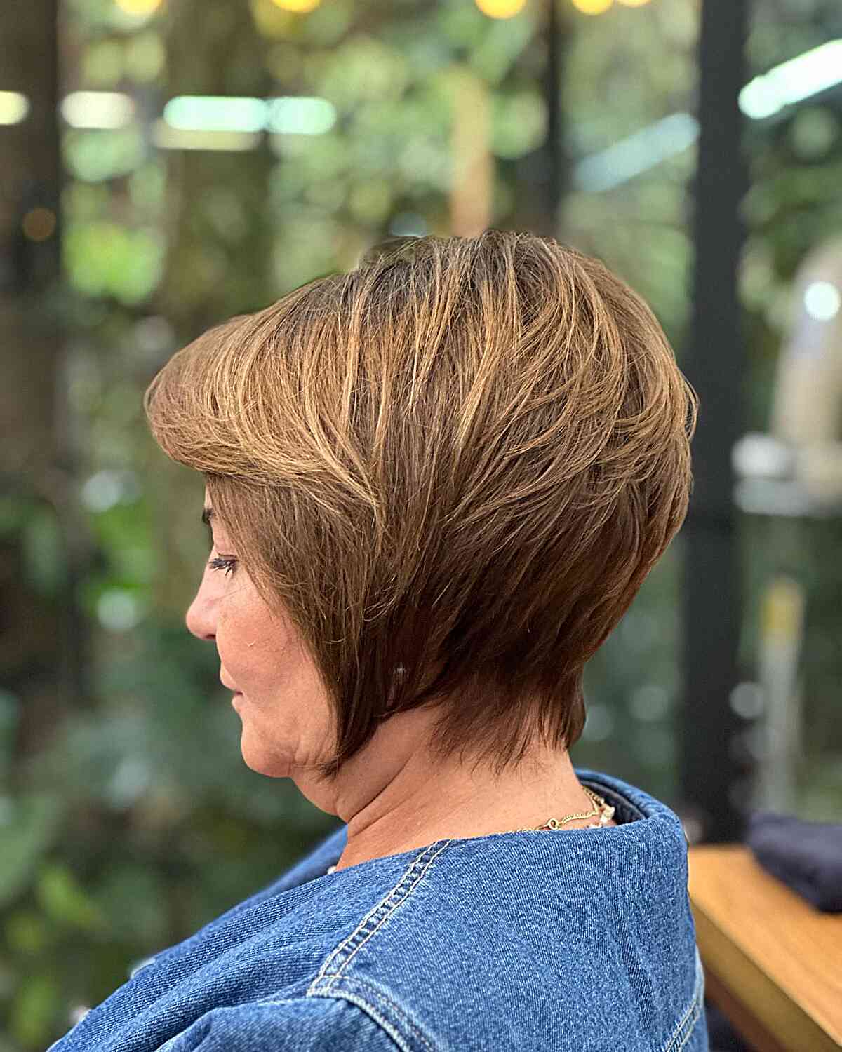 Highlighted Layers on a Lixie Cut for older ladies with brunette thick hair